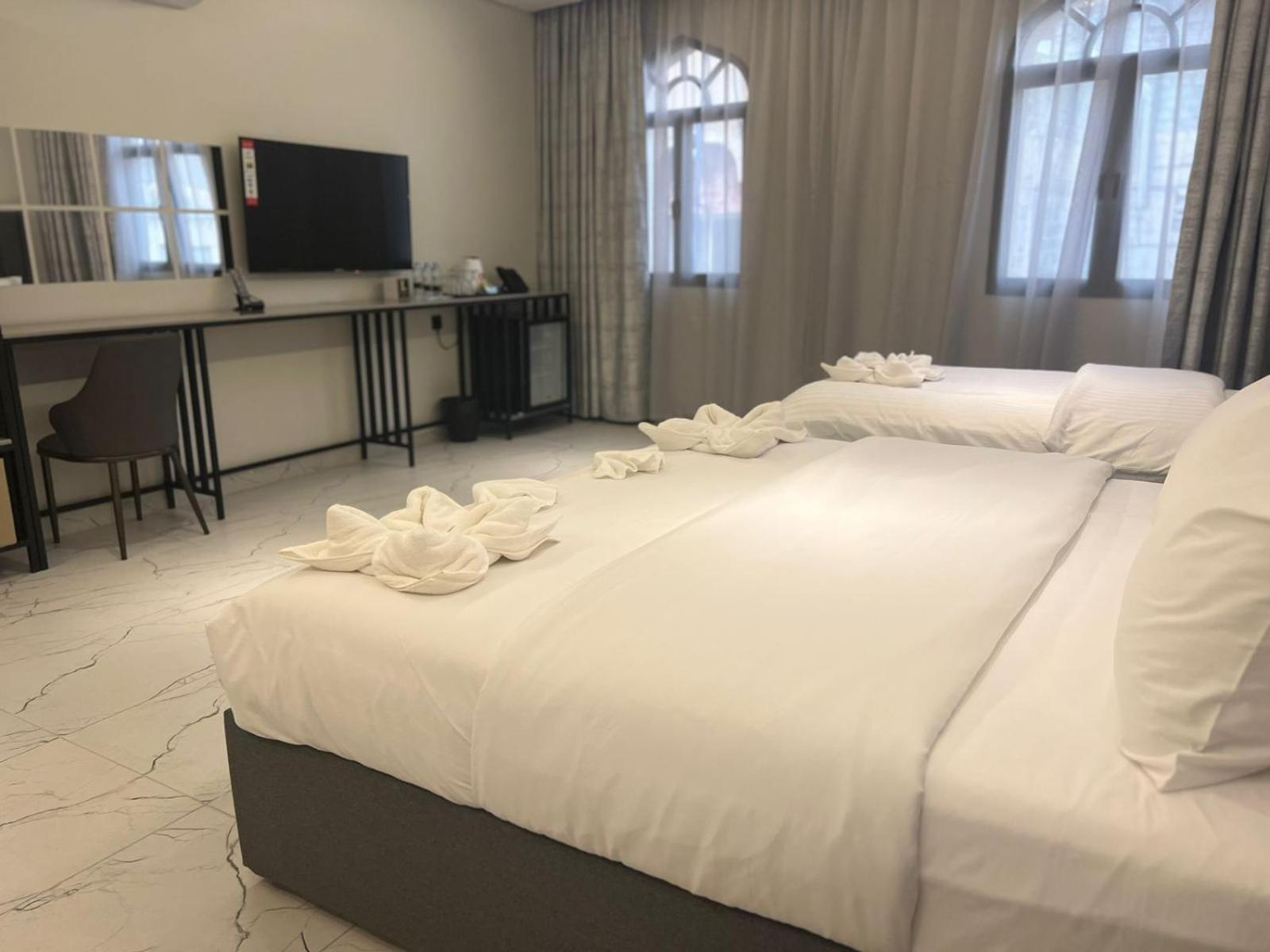 Lavenue Resthouse Apartment Низва Стая снимка
