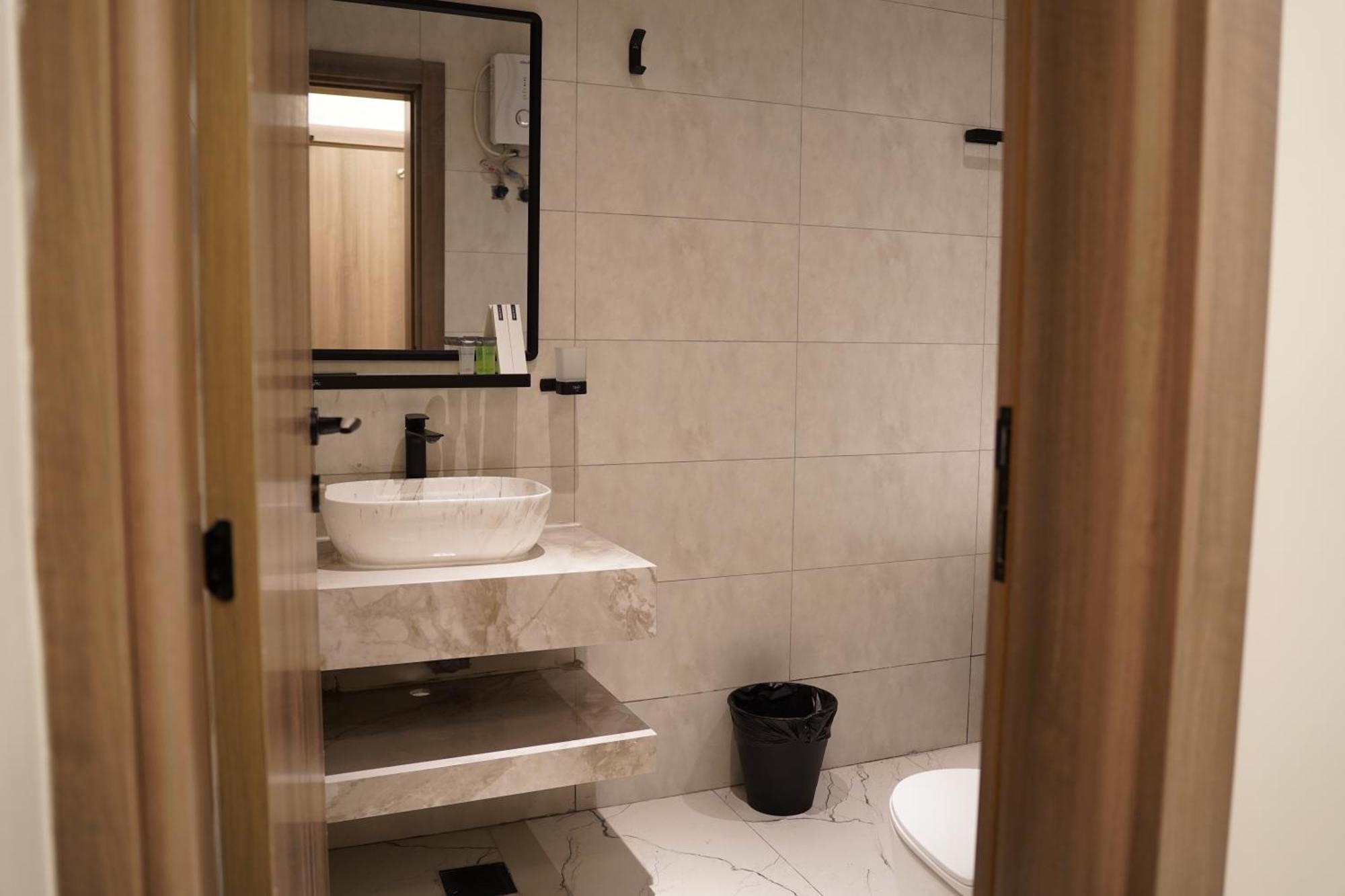 Lavenue Resthouse Apartment Низва Екстериор снимка